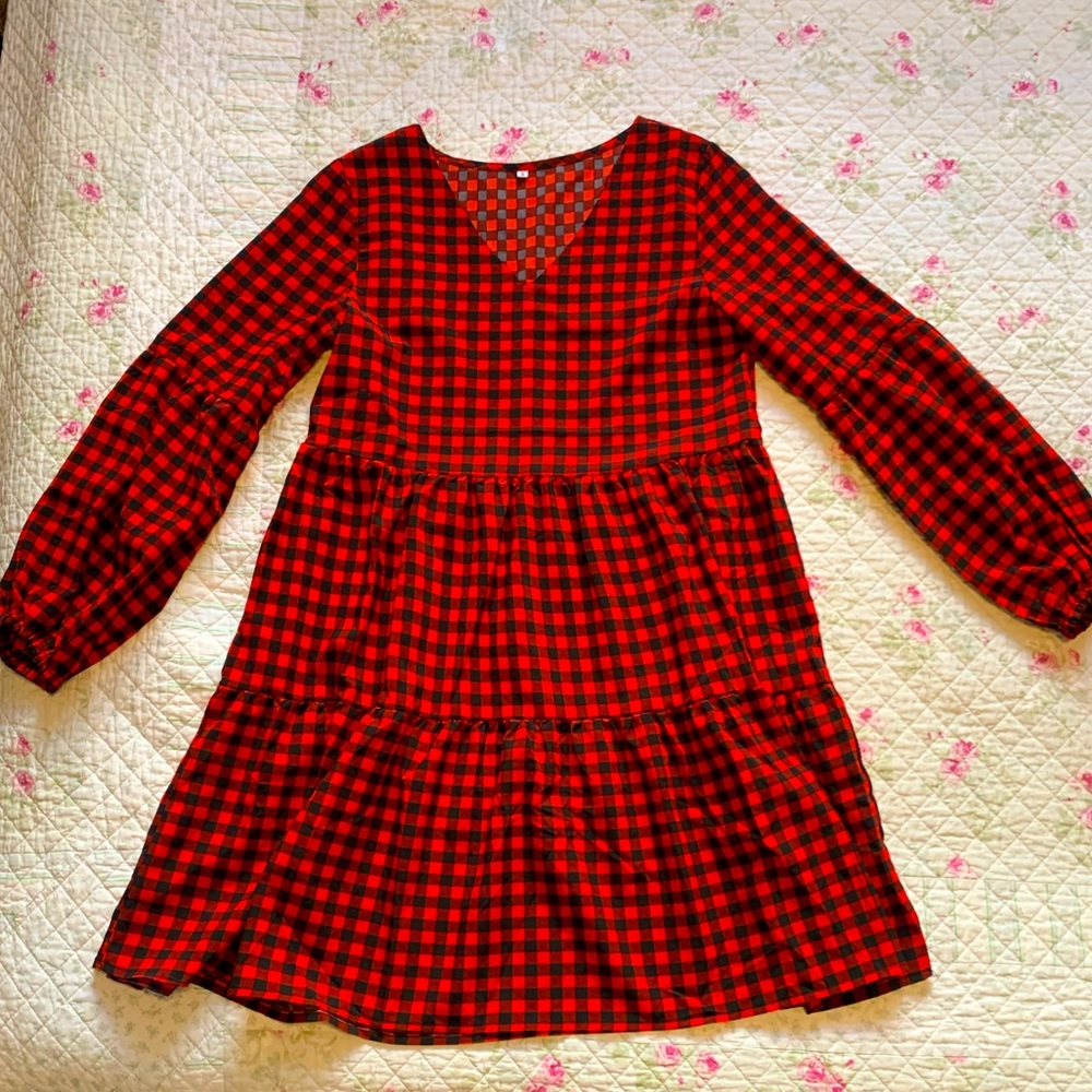 Small red and black long sleeve ruffle dress. Worn once. Super cute.